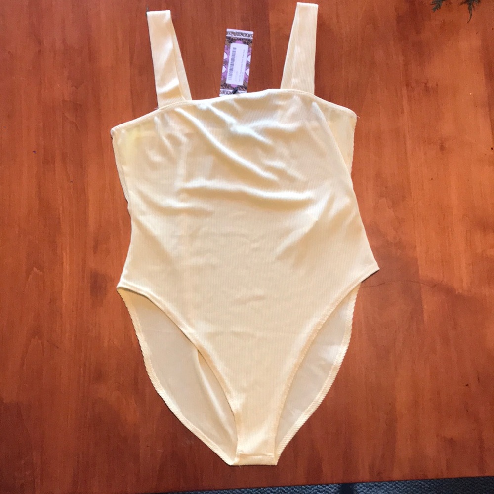 Yellow ribbed body suit